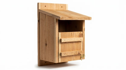 Handcrafted untreated cedar open-front nest box with hinged clean-out door and brass latch on pure white background - BIRDLOVER