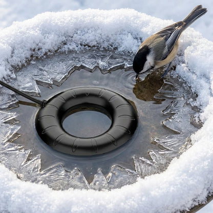 Close-up of the ultra-low profile 0.79 inch Matte Black Ring Bird Bath Heater melting ice for a Black-Capped Chickadee