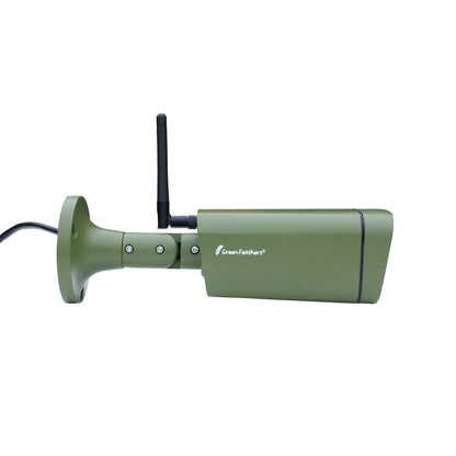 Green security camera with antenna on a white background
