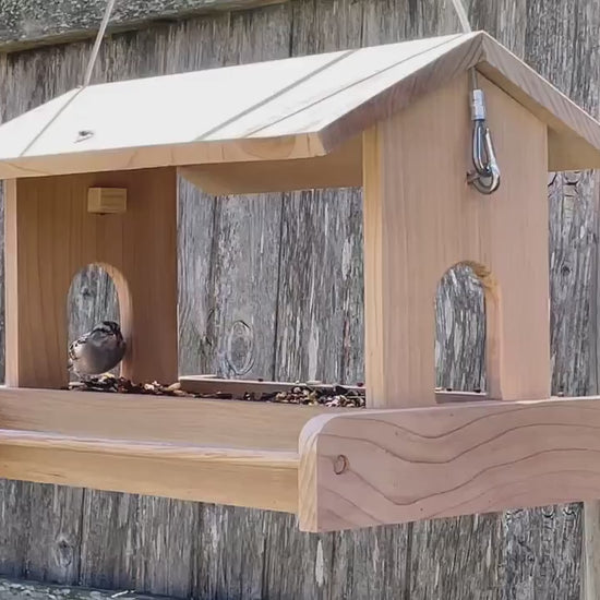 Large, handmade fly through feeder with high capacity seed tray.mp4